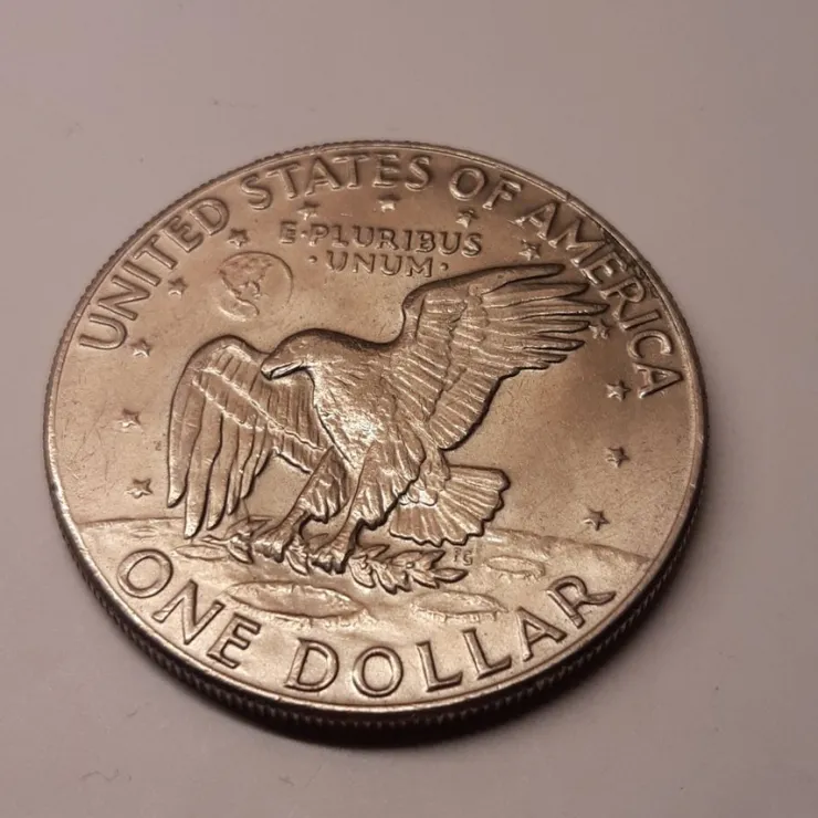 Tradera Amerikansk dollarmynt från 1974 i ett bra och fint bruksskick.| Udenlandske Mønter