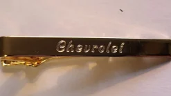 Tradera Chevrolet slipshållare i gulmetall> Slipsenåle