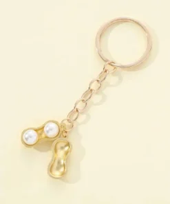 Store Ny i sealad förpackning- Guldförgylld Rolig nyckelring med jordnöt & 2 vita pär Nøgleringe & Nøgleetuier