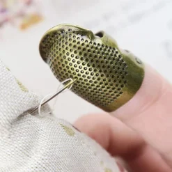 Tradera NYHET Sömnadsnålsskydd i metall -2 st| Øvrigt Hobby