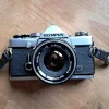 Tradera Olympus OM-1 med normal optik, Repobjekt.| Fotokameraer