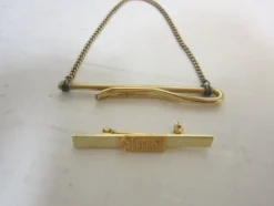 Tradera Slipsnålar i metall guldfärgade> Slipsenåle