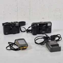 Tradera 2st kameror, batteriladdare & GPS - Canon G10 - Minolta - Garmin| Fotokameraer