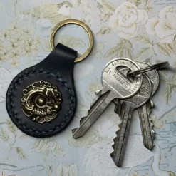 Online Stilfull nyckelhållare med dekorativ concho Nøgleringe & Nøgleetuier