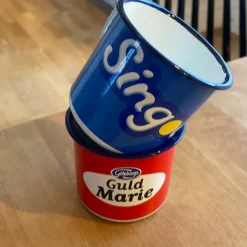 Tradera Två emaljmuggar - Singoalla & mariekex> Øvrige Samleobjekter